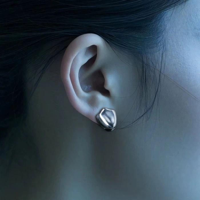Asymmetrical Shield-like stud earring