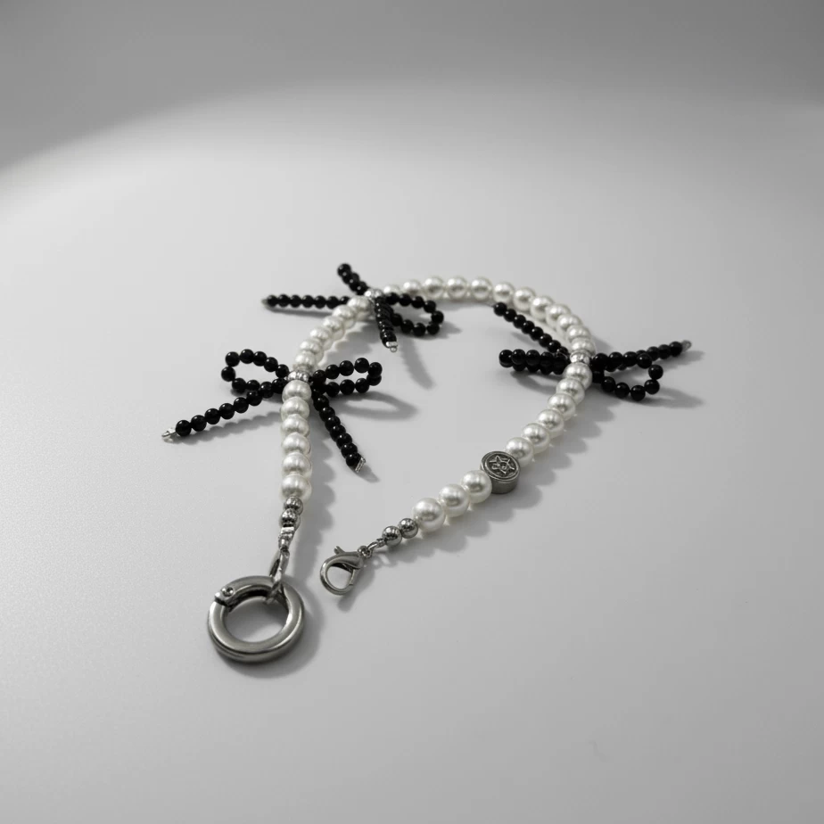 Black Bow Pearl Charm